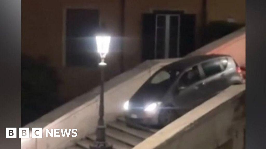 Watch: Man gets stuck driving car down Rome’s Spanish Steps