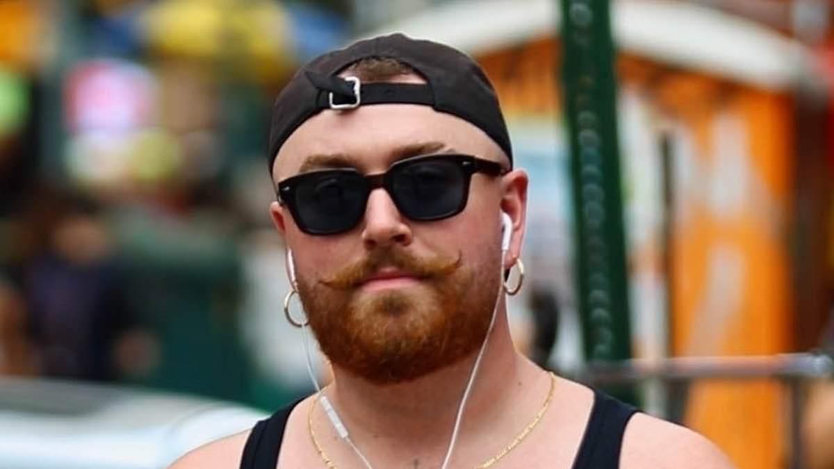 Sam Smith puts on a quirky display in purple shorts and loafers as they enjoy a solo summer stroll through the streets of New York
